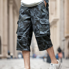Men'S Outdoor Casual Cargo Shorts with Multiple Pockets, Knee-Length, Featuring an Elastic Waistband And Button Closure, Suitable for Outdoor Adventures, Fishing, Hiking, And Various Outdoor Activities.